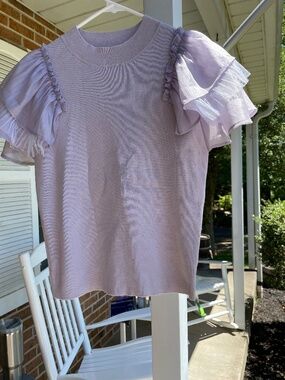 Pretty lavender knit top from the fashion brand Noela.